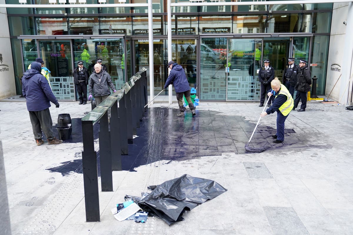 Extinction Rebellion throw black paint over Michael Gove&rsquo;s office