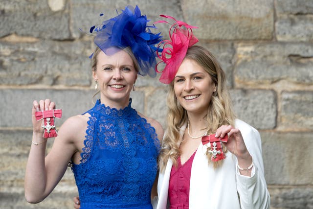 Victoria Drummond (left) and Mili Smith after being made Members of the Order of the British Empire (PA)