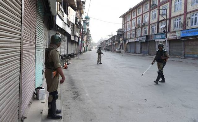 <p>File Indian paramilitary troopers patrol during a curfew in Srinagar on July 8, 2017</p>