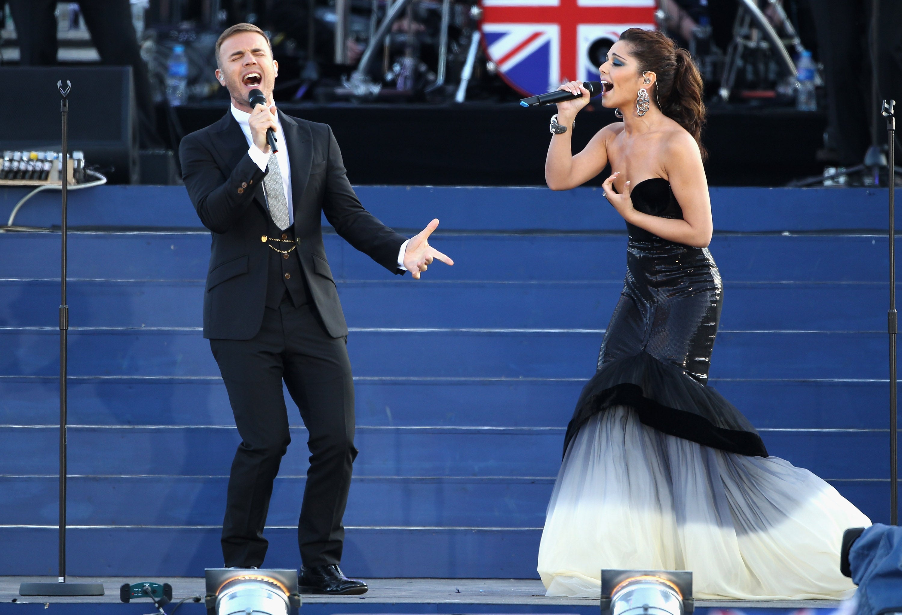 Singers Gary Barlow and Cheryl Cole perform on stage during the Queen’s Diamond Jubilee concert at Buckingham Palace on 4 June 2012