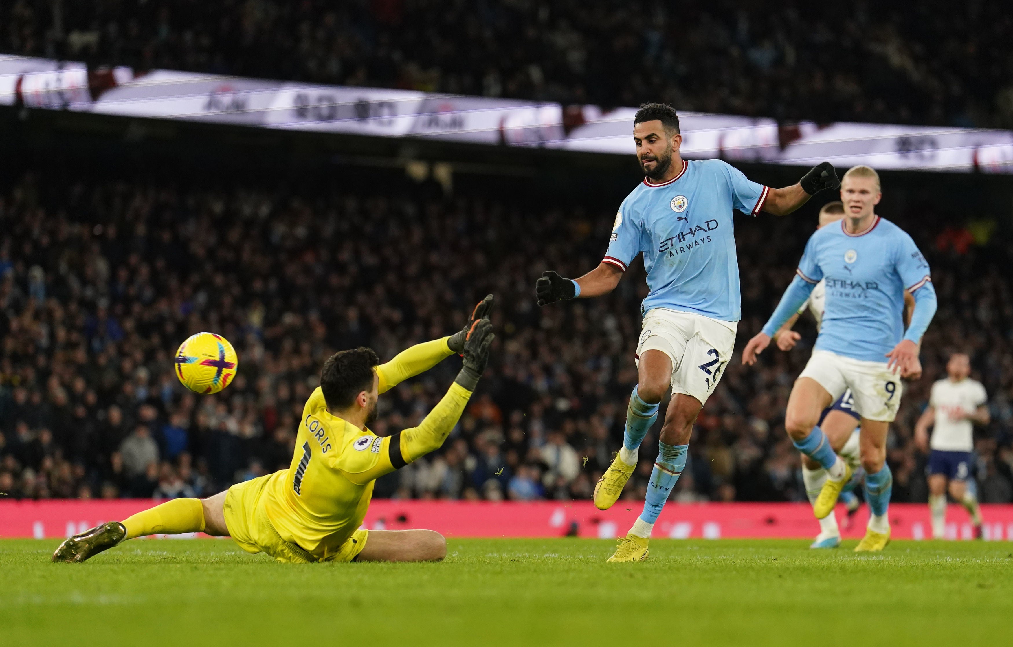 <p>Riyad Mahrez dinks home City’s fourth goal</p>