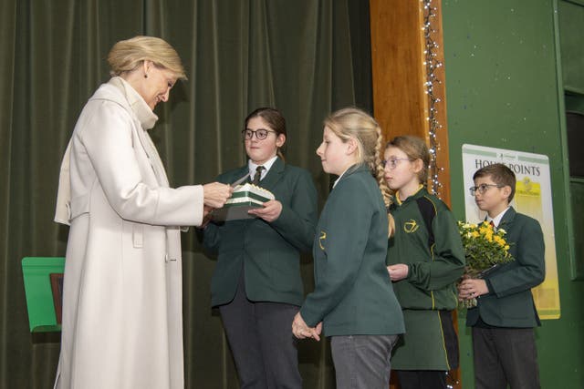 The Countess of Wessex is presented with a birthday cake (PA)