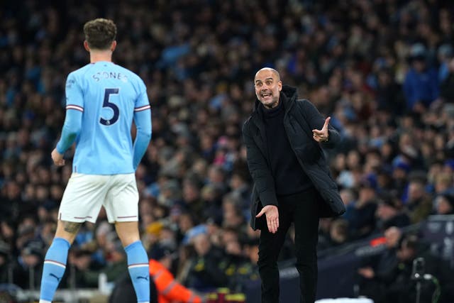 <p>Pep Guardiola gesticulates from the touchline during City’s win over Spurs</p>