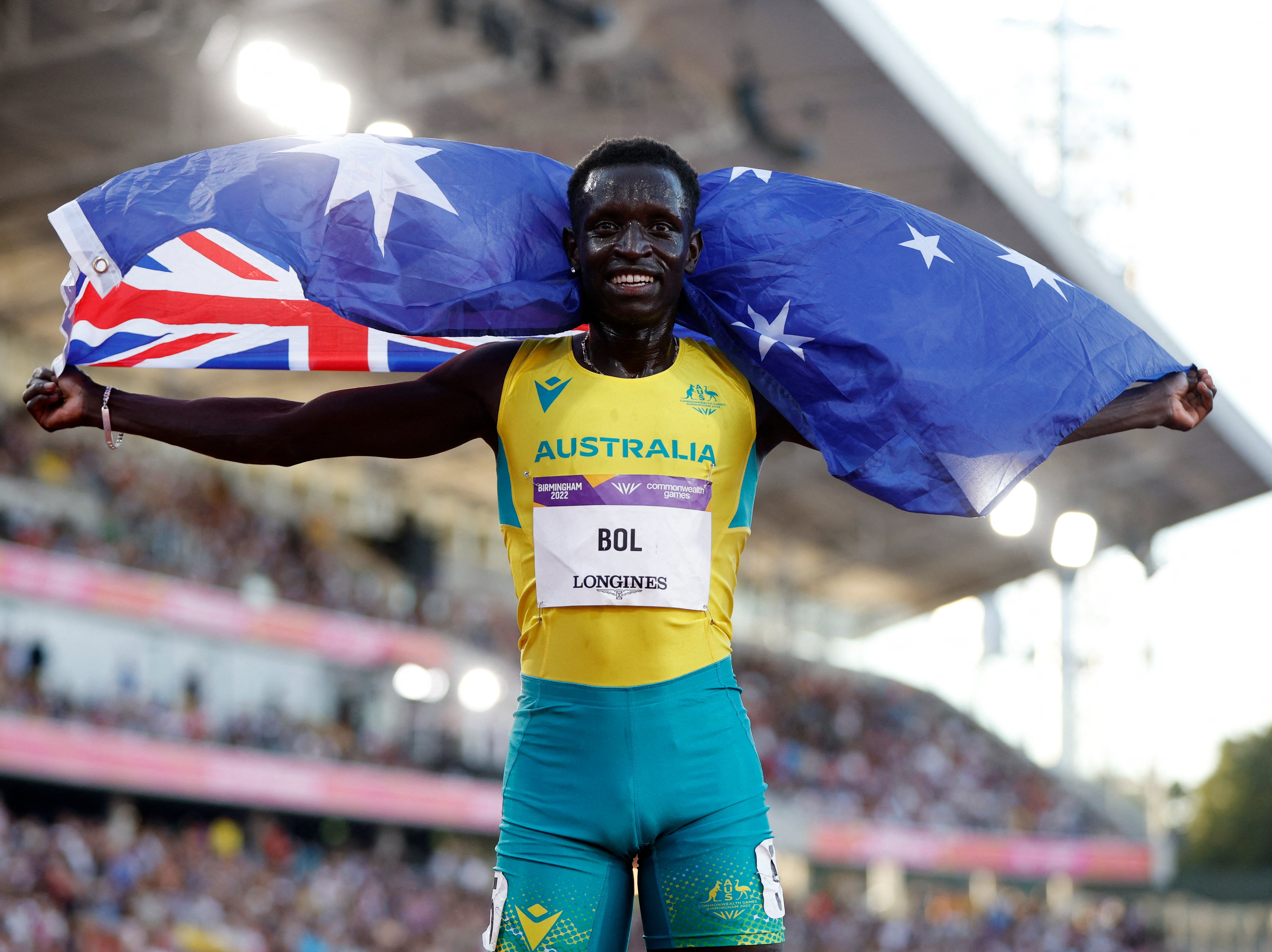 Australia’s Peter Bol celebrates after winning silver at the Commonwealth Games