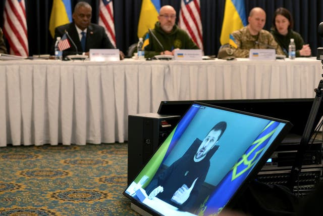 President Volodymyr Zelensky appears via video at a meeting of the Ukraine Defence Contact Group at Ramstein airbase in Germany (Michael Probst/AP/PA)