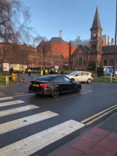 Man arrested and hospital evacuated as bomb squad called out to ‘suspicious package’