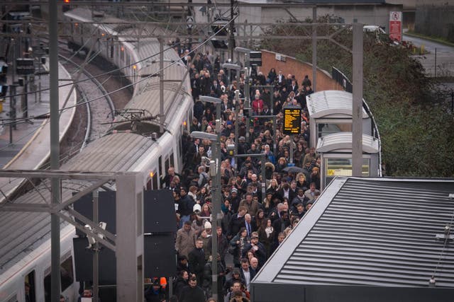 Commuters at Stratford railway station