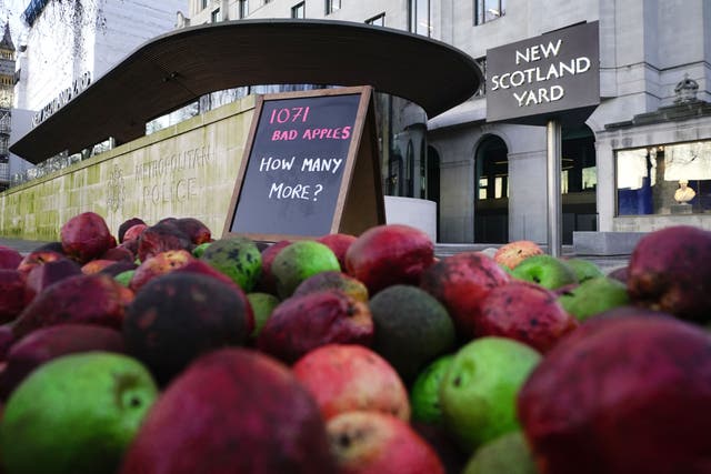 Rotten apples placed outside New Scotland Yard as part of a protest (Aaron Chown/PA)