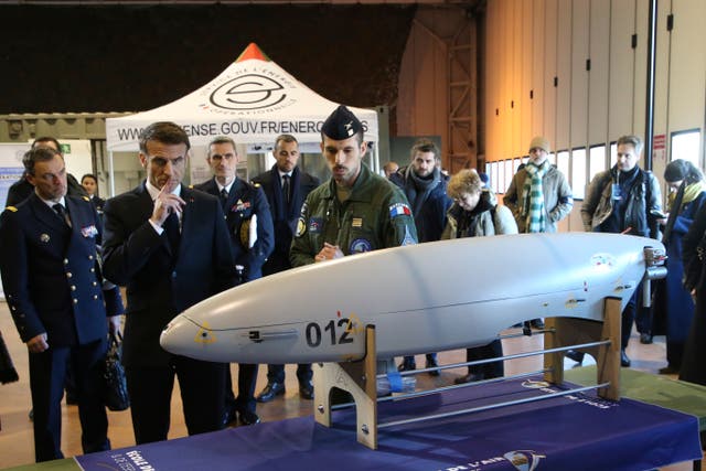 <p>French President Emmanuel Macron views a military drone as he visits the Mont-de-Marsan air base</p>