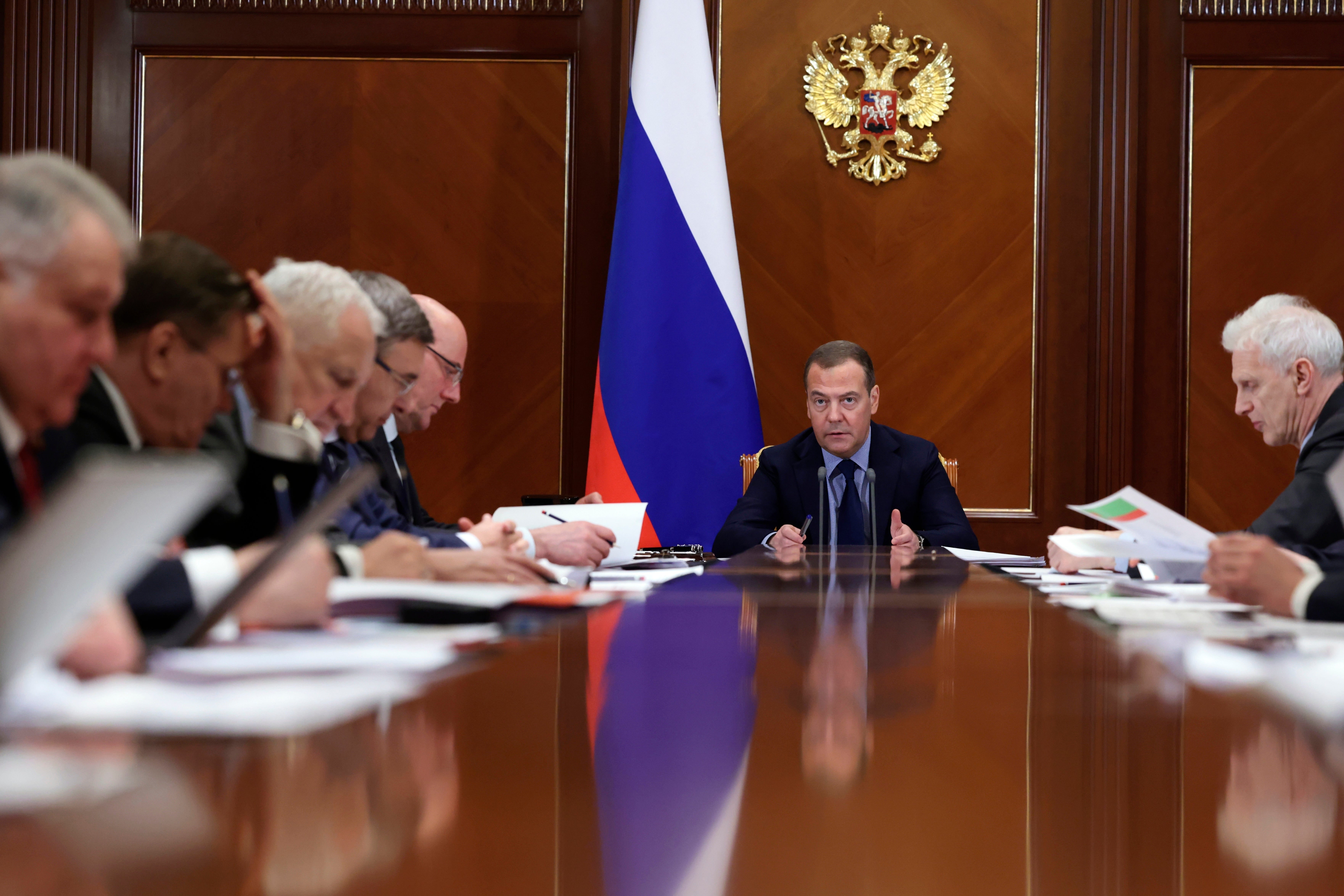 Former Russian President Dmitry Medvedev (centre)