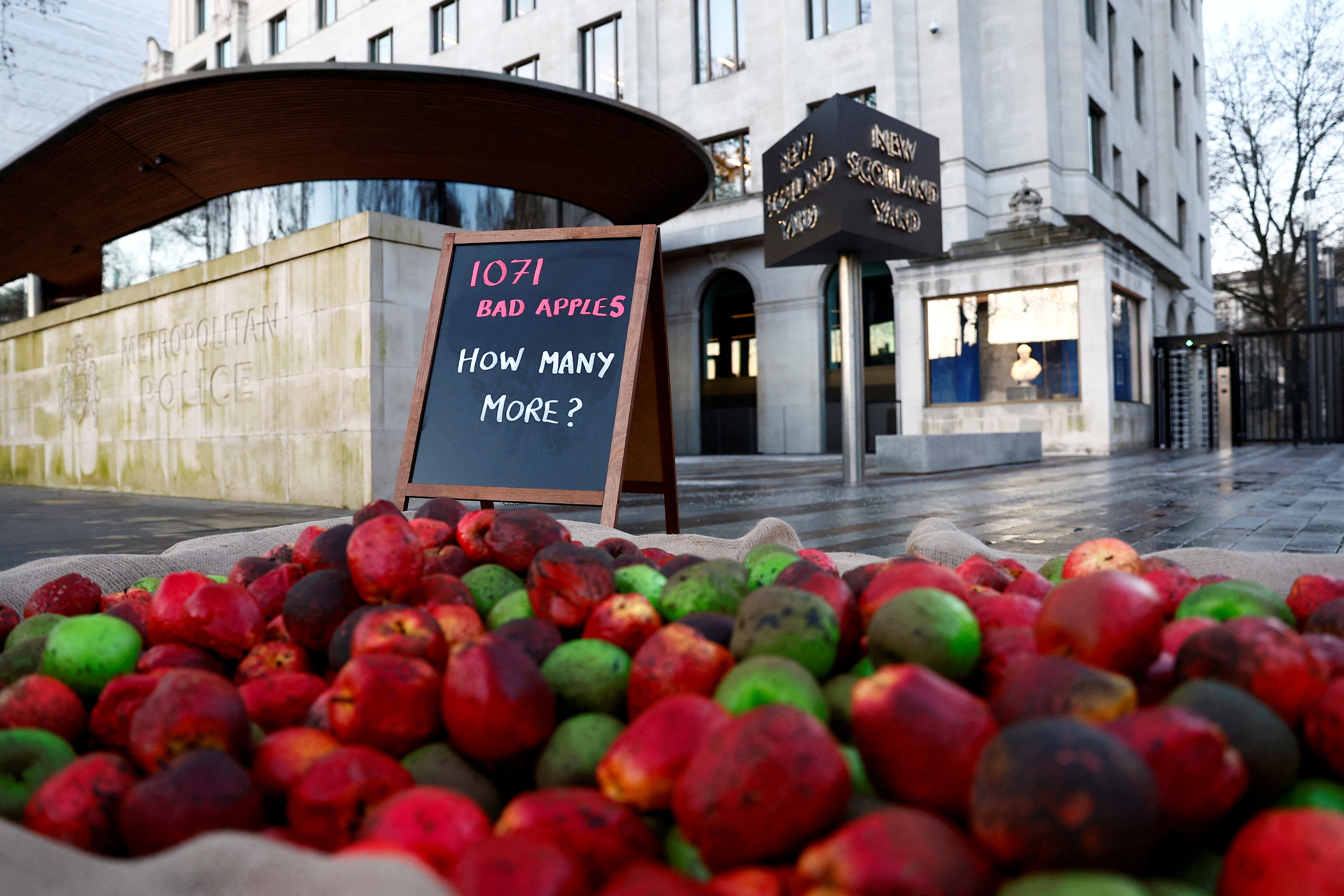 ‘Rotten apples’ left outside New Scotland Yard as part of a protest by the Refuge charity
