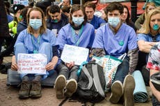 Junior doctors in England back strike action