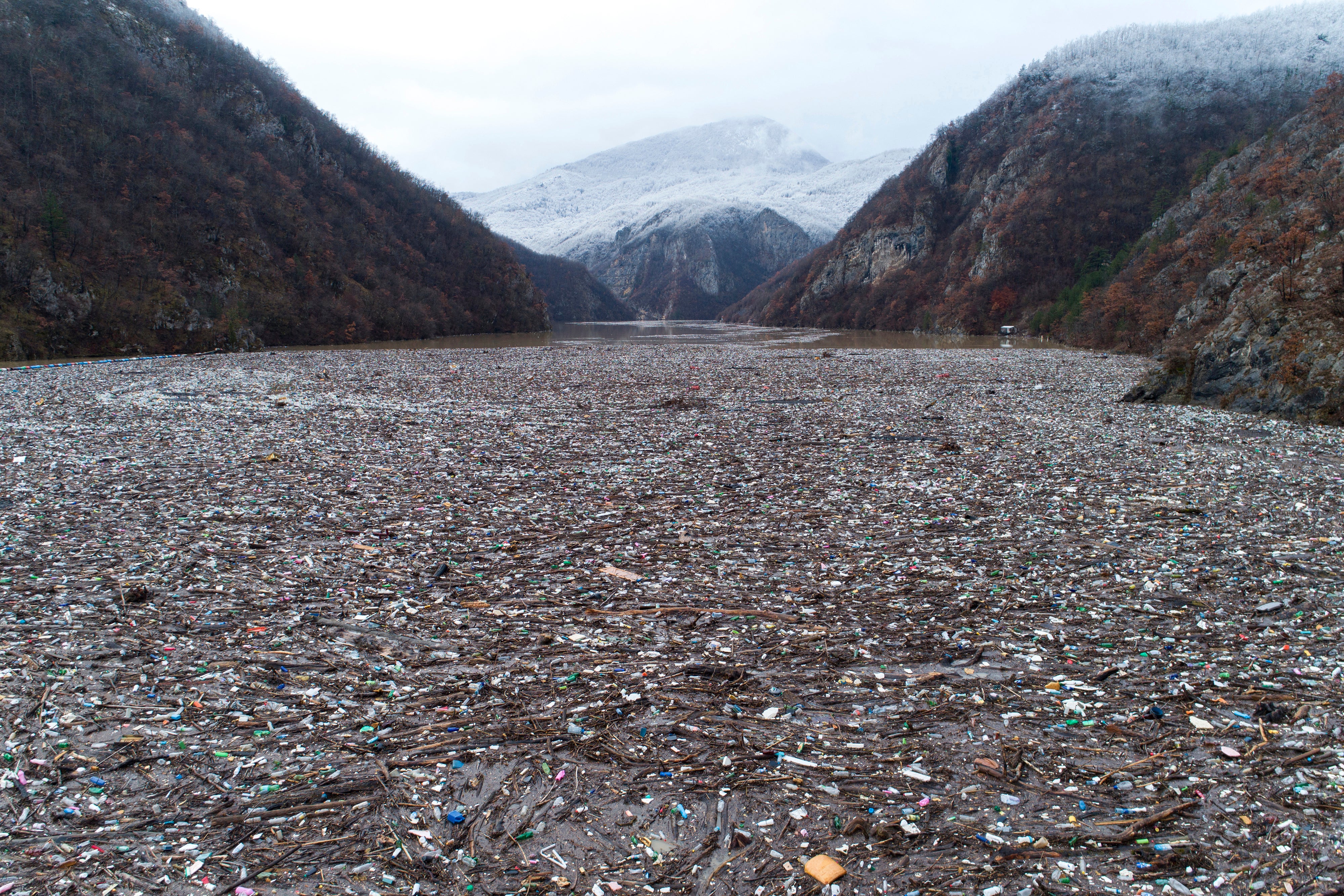 APTOPIX Bosnia River Pollution