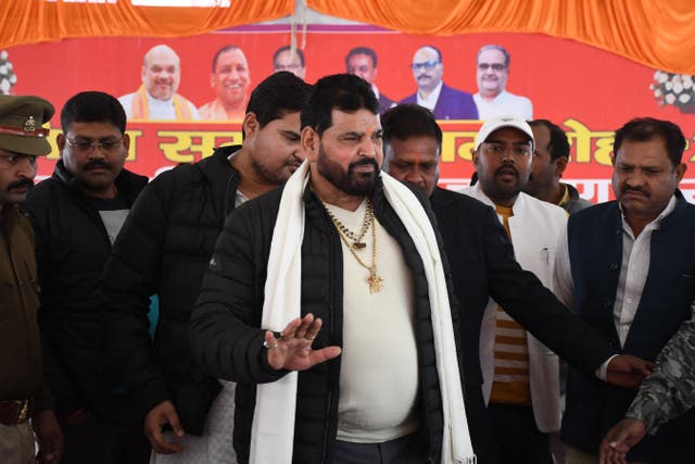<p>Wrestling Federation of India (WFI) president Brij Bhushan Sharan Singh (centre) arrives to address a press conference in January 2023 </p>