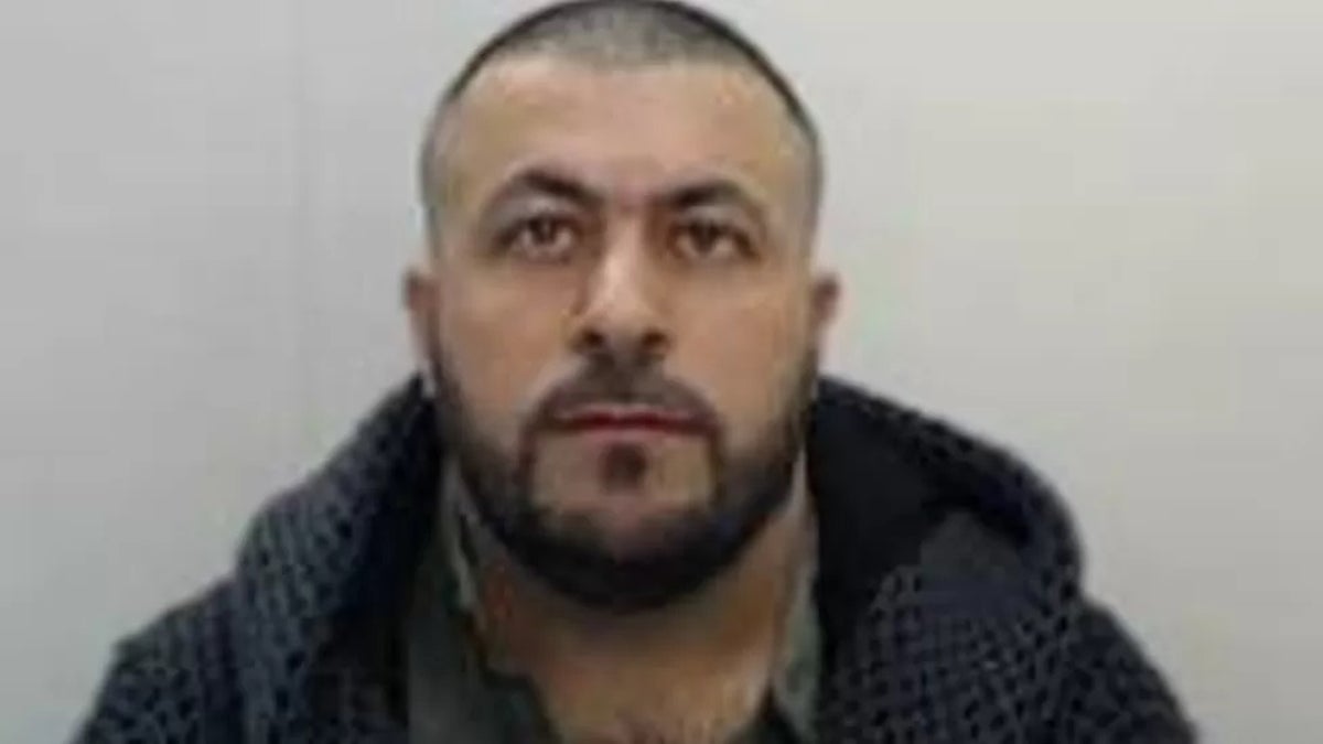 Head of people-smuggling ring who fled UK to avoid prison is arrested