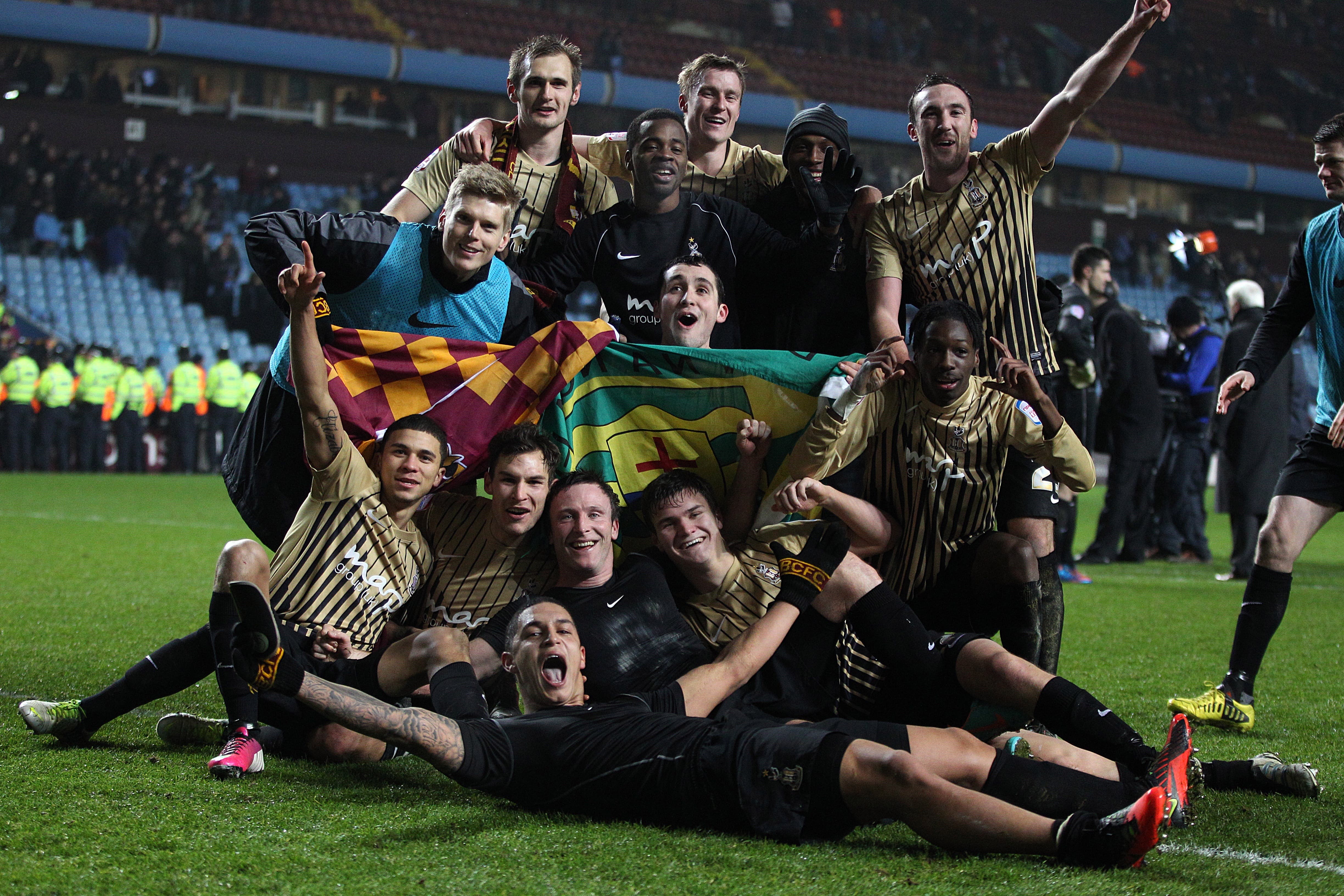 Bradford’s players celebrate after beating Aston Villa on aggregate to make the League Cup final in 2013 (Nick Potts/PA).