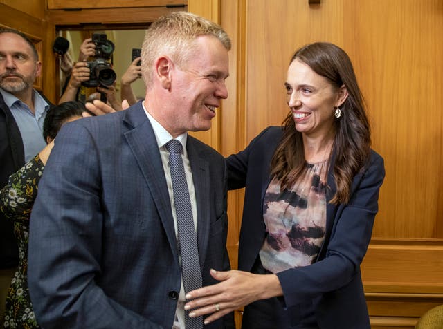 <p>New Zealand Prime Minister Jacinda Ardern, right, and new Labour Party leader Chris Hipkins arrive for their caucus vote at Parliament in Wellington</p>