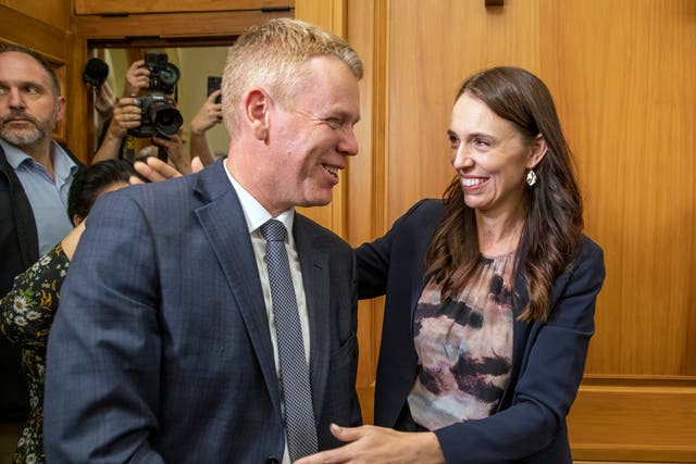 <p>New Zealand Prime Minister Jacinda Ardern, right, and new Labour Party leader Chris Hipkins arrive for their caucus vote at Parliament in Wellington</p>
