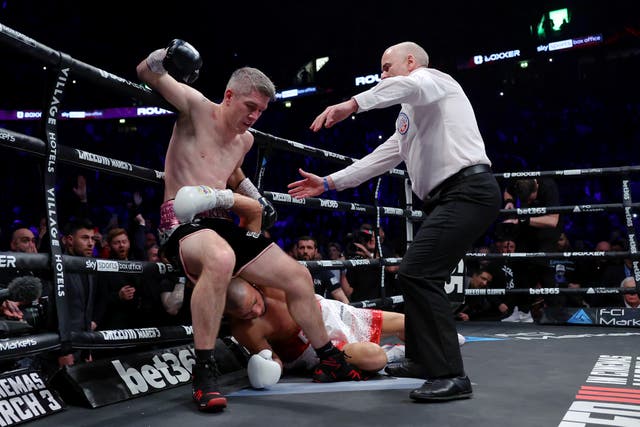 <p>Chris Eubank Jr slumps to the floor moments before Liam Smith is crowned the winner </p>