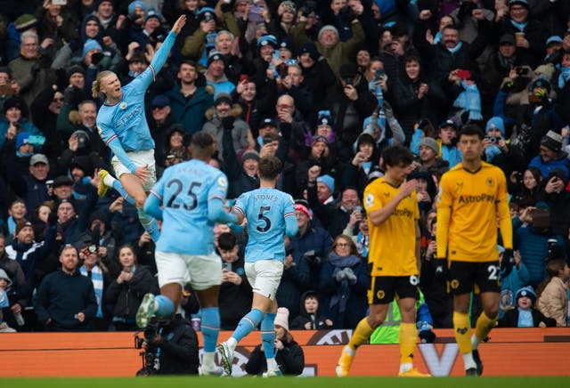 <p>Haaland celebrates after scoring his second goal for Man City against Wolves at the Etihad</p>