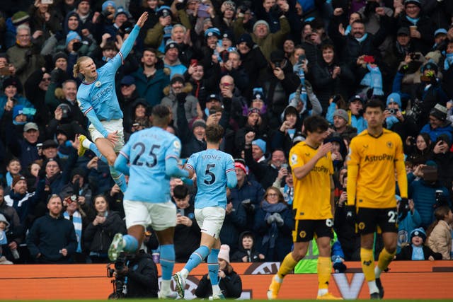 <p>Haaland celebrates after scoring his second goal for Man City against Wolves at the Etihad</p>