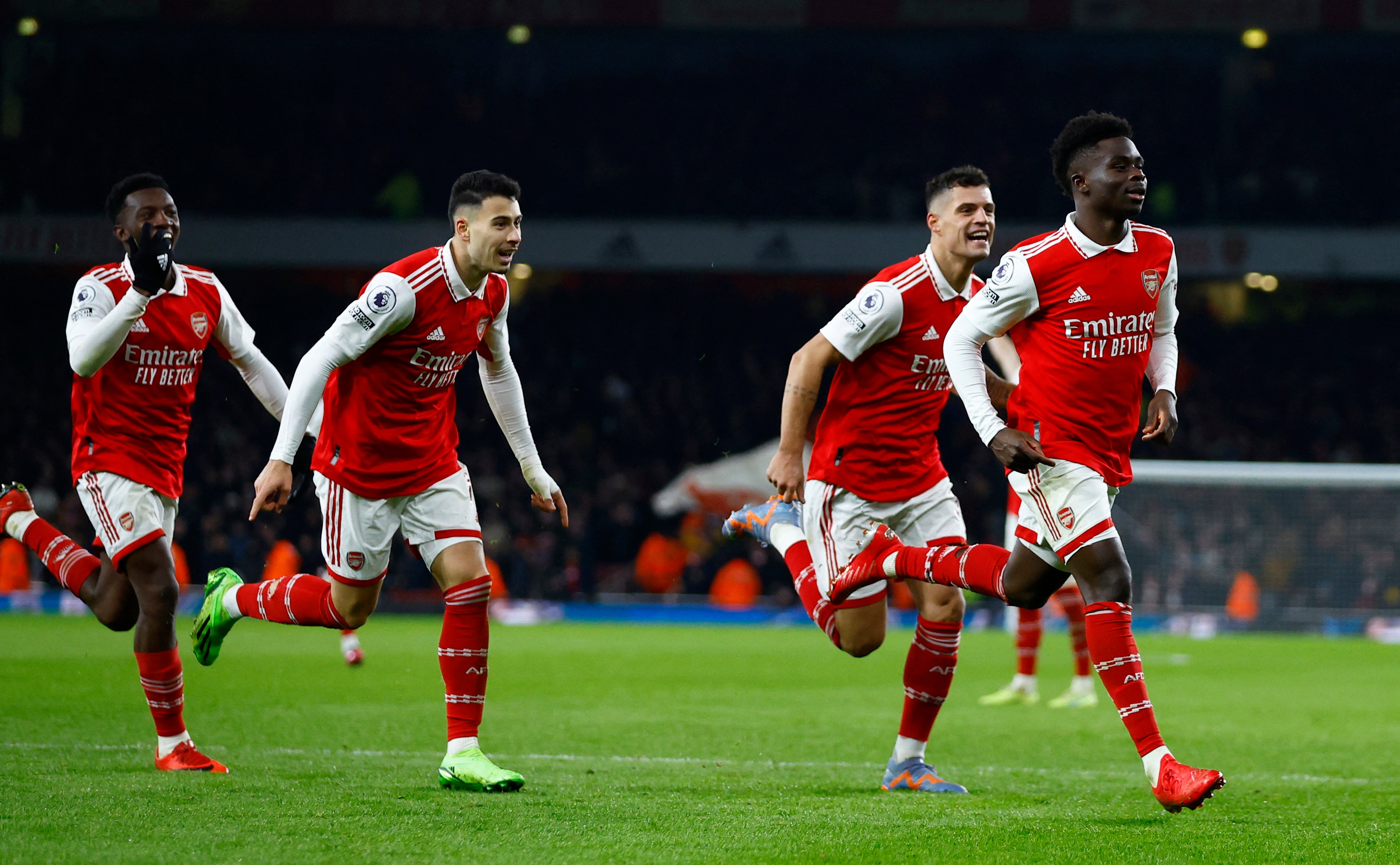 Bukayo Saka, right, celebrates putting Arsenal in front