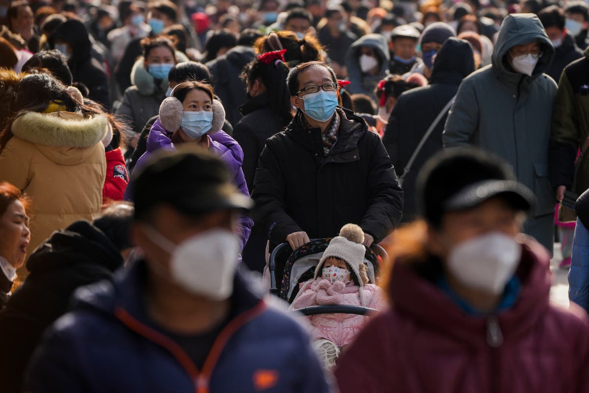 China reports nearly 13,000 Covid deaths in a single week as officials say peak may be over