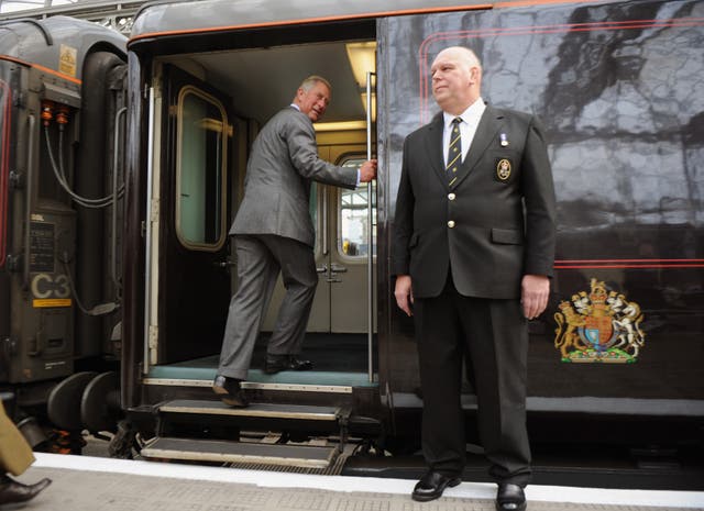<p>King Charles boards the train</p>