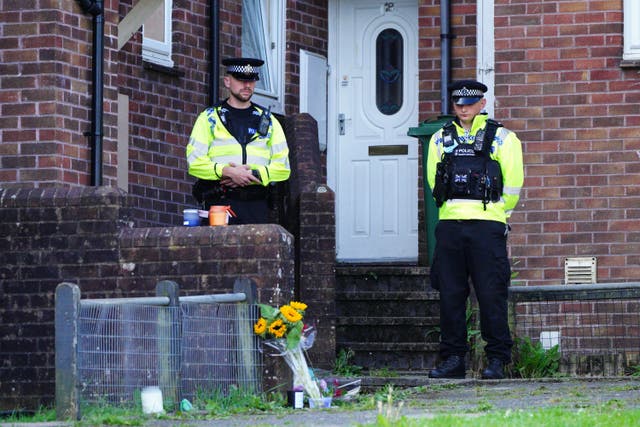 Floral tributes left outside 17 Biddick Drive, Keyham in Plymouth, Devon, where five people were killed by gunman Jake Davison in a firearms incident on Thursday evening. Picture date: Monday August 16, 2021.