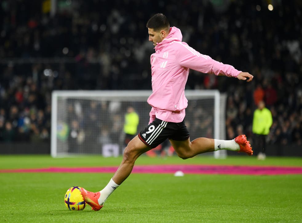 <p>Aleksandar Mitrovic warms up before kick-off</p>