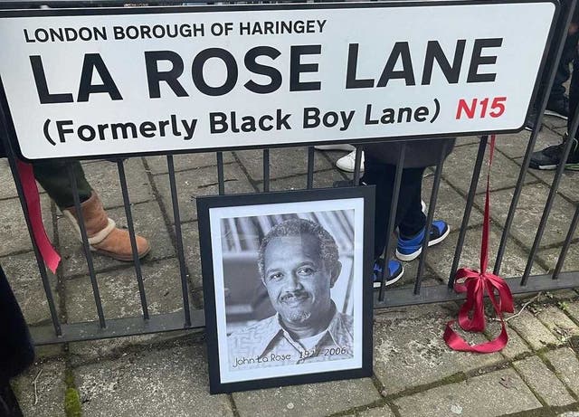 <p>The newly unveiled La Rose Lane street sign</p>