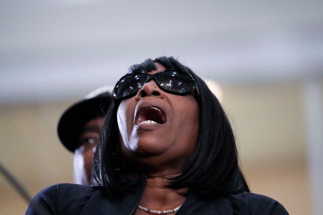 <p>RowVaughn Wells, mother of Tyre Nichols, calls out her son’s name as she is comforted by his stepfather Rodney Wells, at a news conference in Memphis, Tennessee </p>