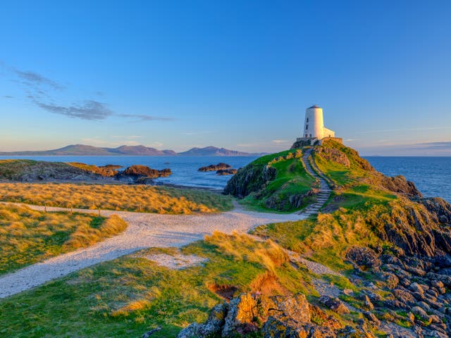<p>Twr Mar lighthouse on Llanddwyn Island off Anglesey</p>