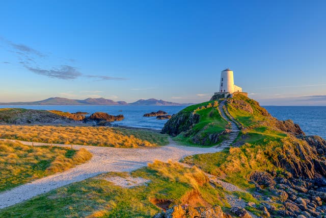 <p>Twr Mar lighthouse on Llanddwyn Island off Anglesey</p>