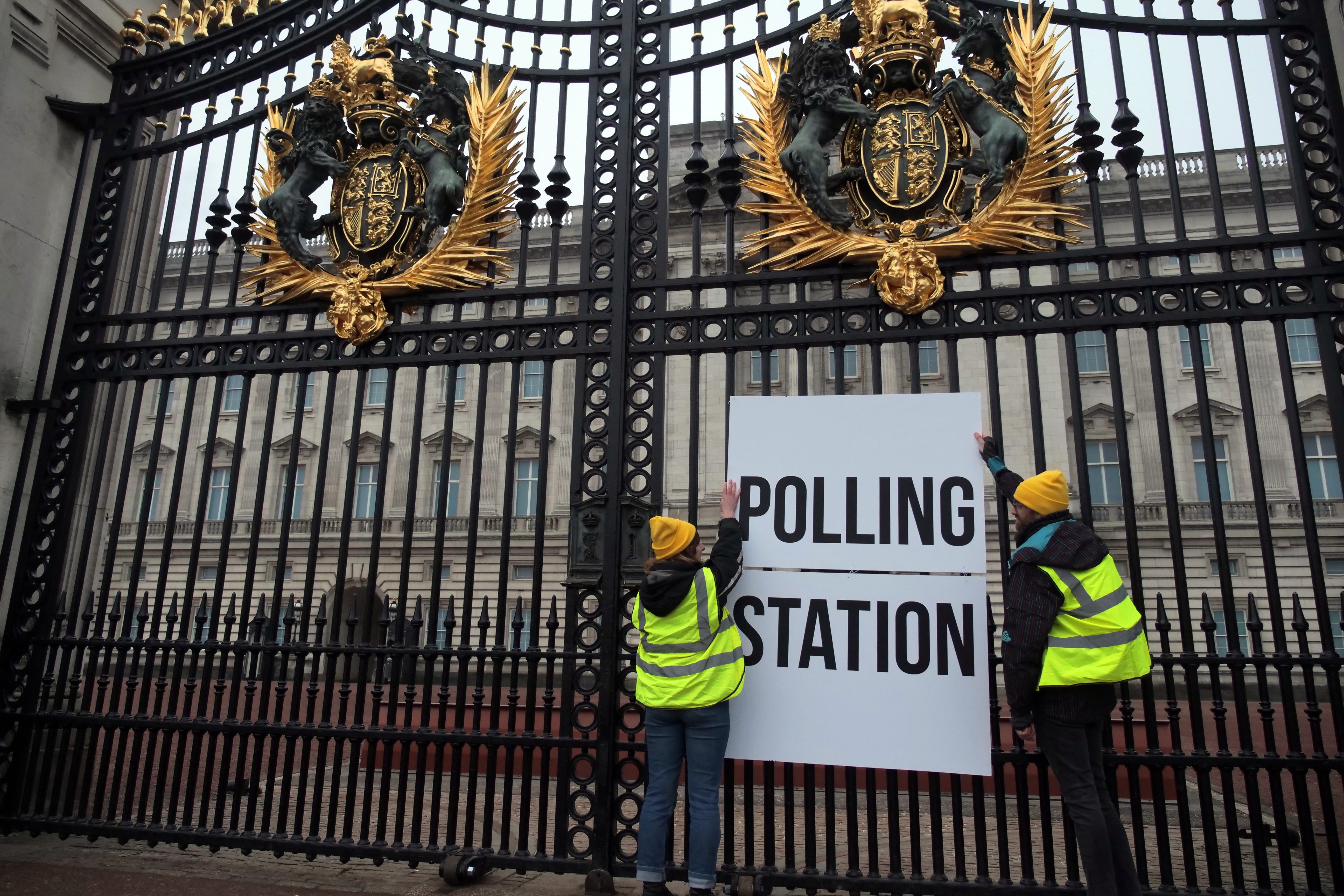 Activists from Republic put a polling station sign on the gates of Buckingham Palace.
