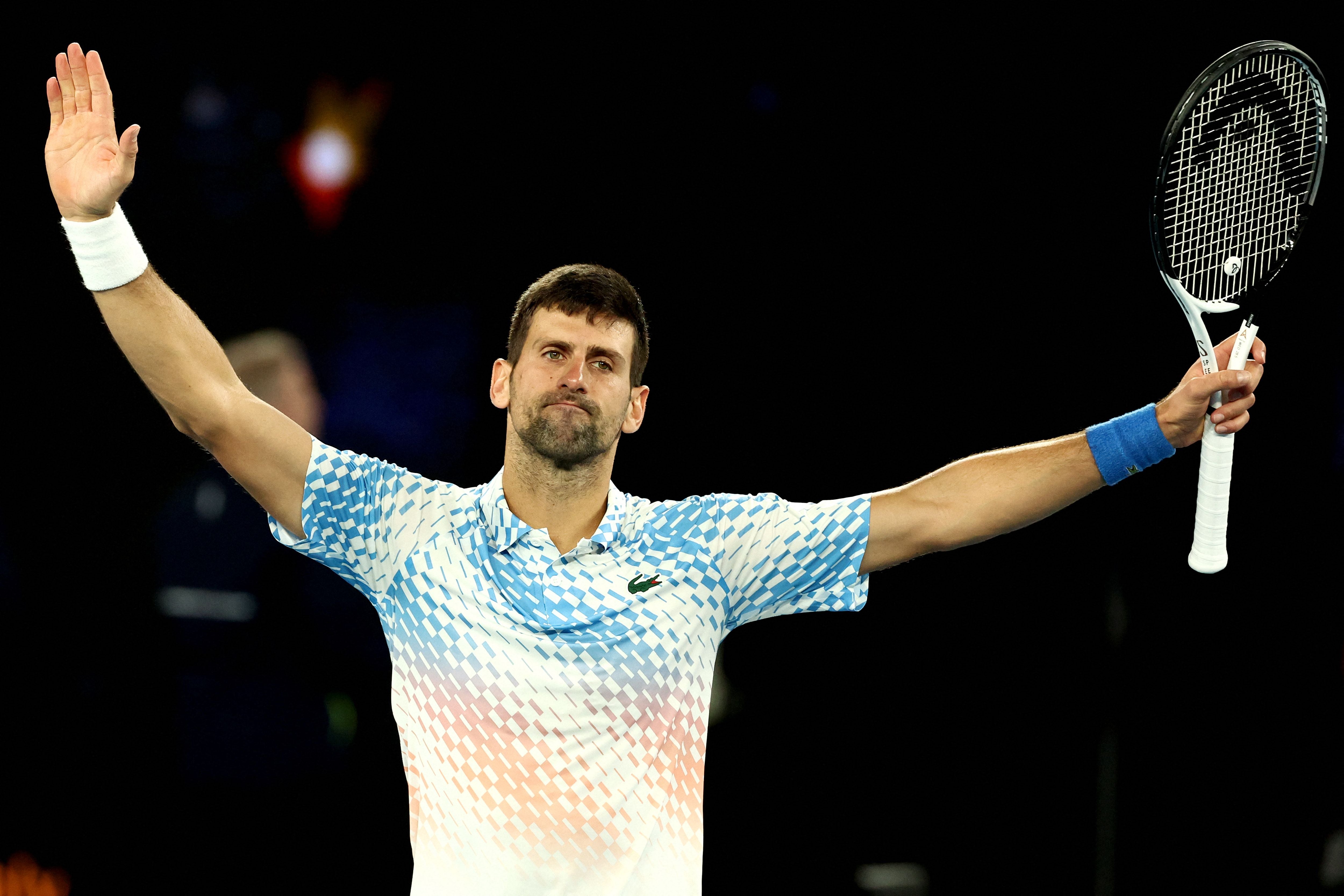 Serbia's Novak Djokovic celebrates victory against Andrey Rublev
