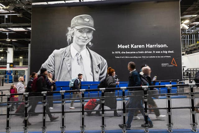 A giant mural celebrating the woman who led the charge for female train drivers has been unveiled at London Euston station as part of a recruitment campaign (Avanti West Coast/PA)