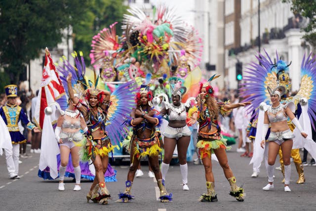 Performers at the Notting Hill Carnival in London in 2022 (Kirsty O’Connor/PA)
