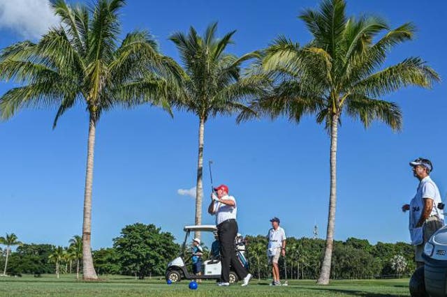 <p>File: Former US president Donald Trump plays golf at Trump National Doral Miami golf club on 27 October 2022 in Miami, Florida, a day ahead of the 2022 LIV Golf Invitational Miami</p>