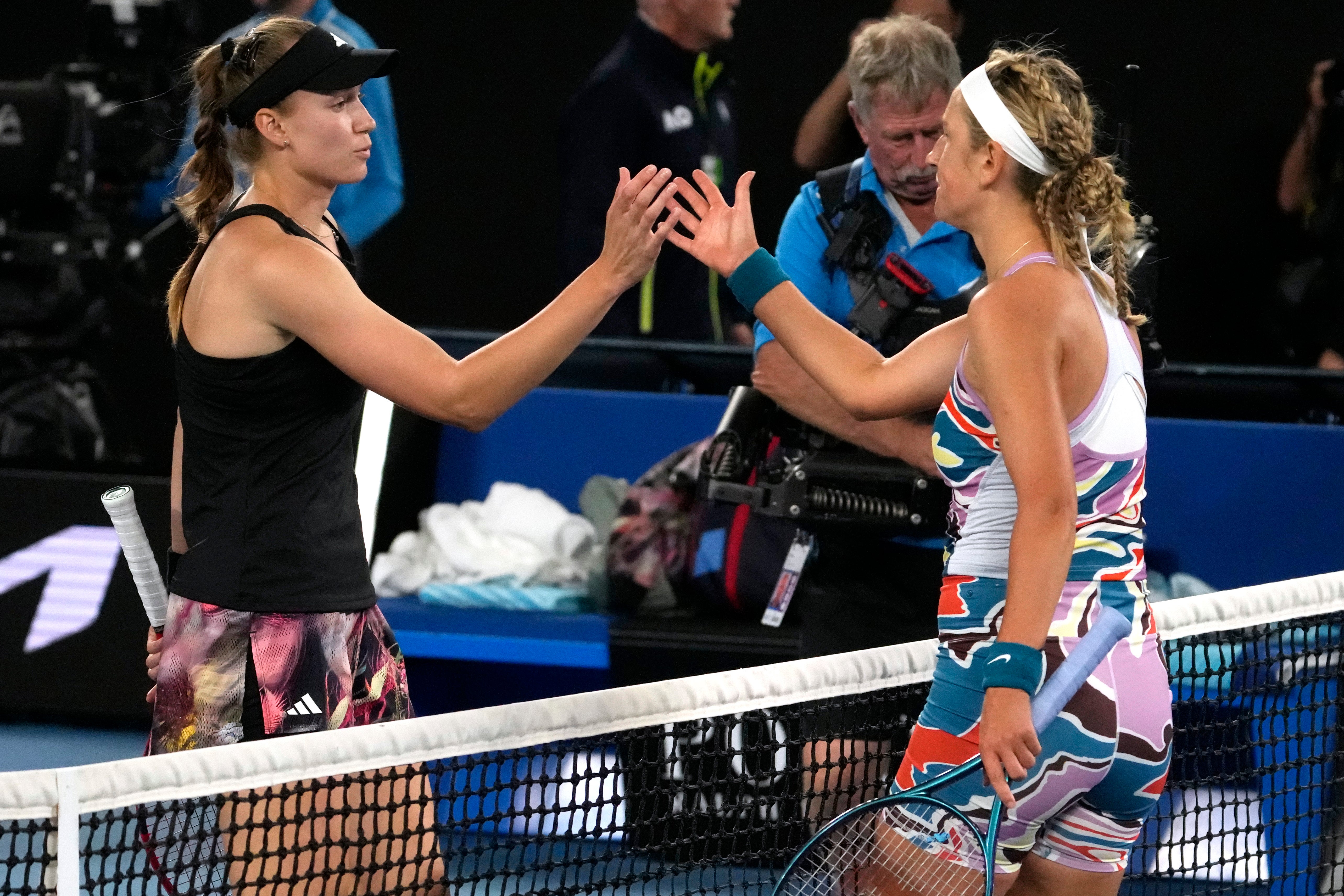 Rybakina, left, is congratulated by Victoria Azarenka after their semi-final