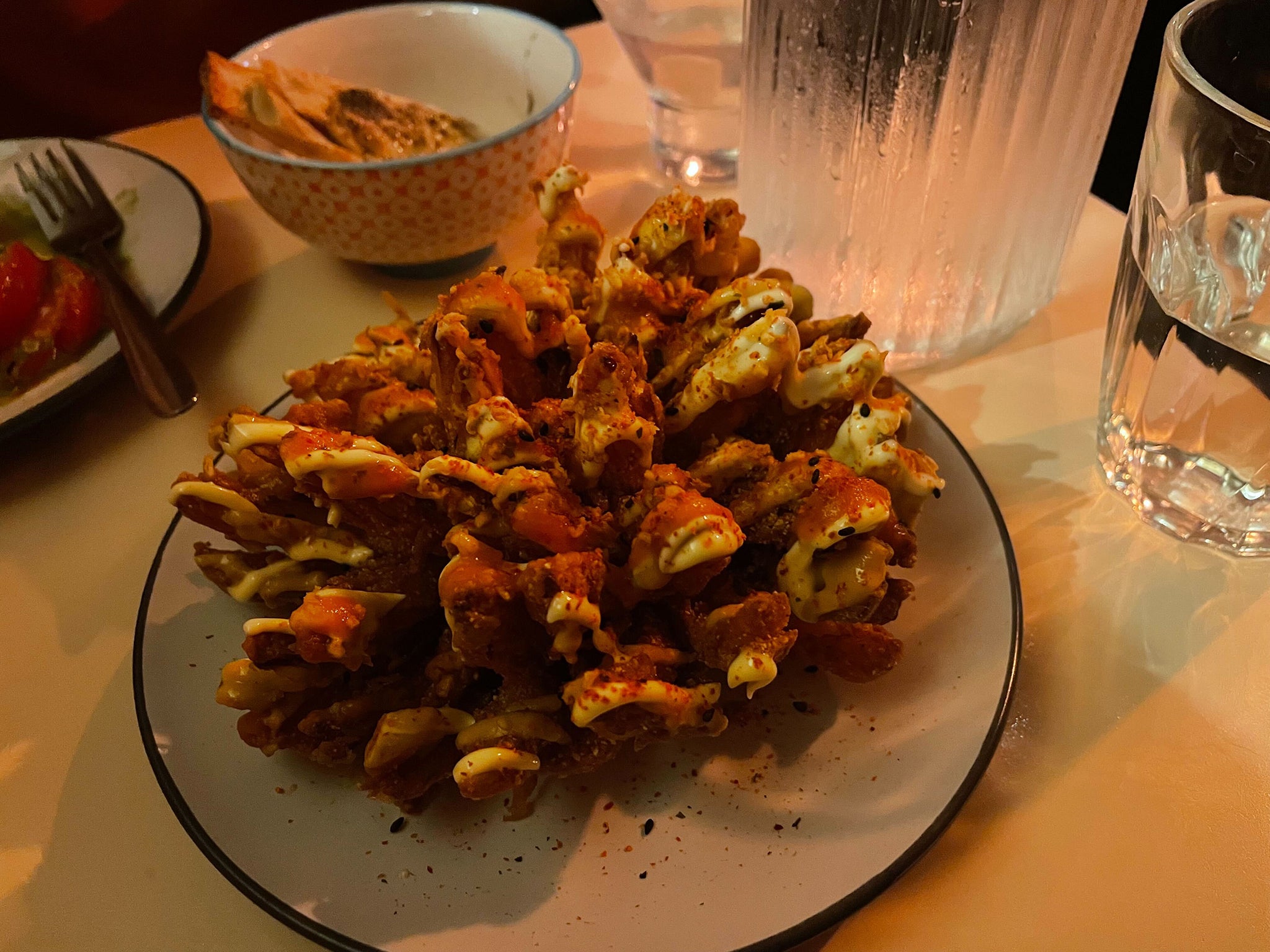 Bloomin’ beautiful: The blooming onion with lashings of Kewpie mayo is something to behold