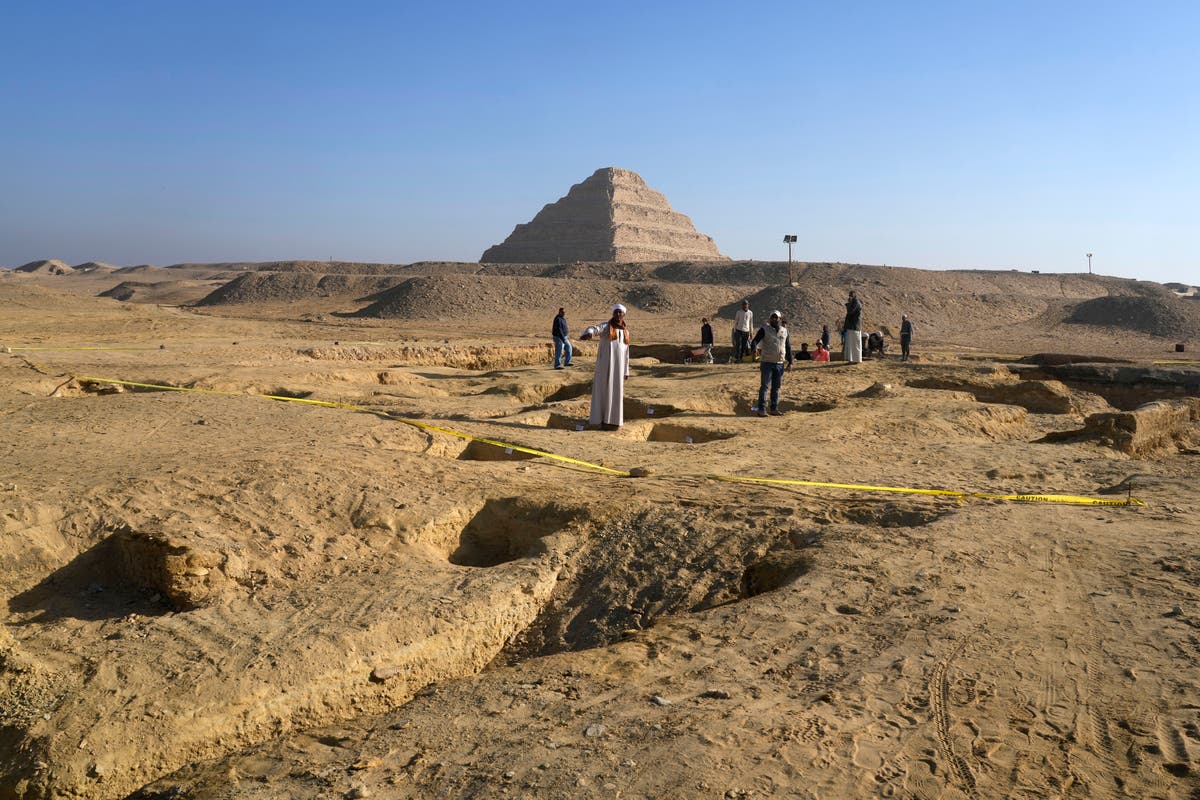 Egypt unveils tombs and sarcophagus in new excavation