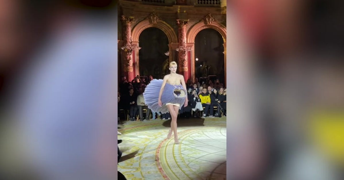 Fed up Valentino catwalk model throws shoes off runway during