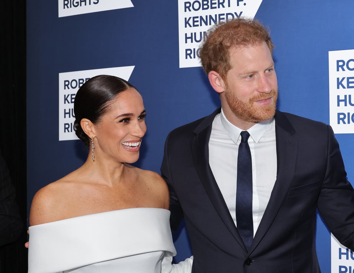 Prince Harry says he and Meghan Markle revealed their pregnancy at Princess Eugenie’s wedding