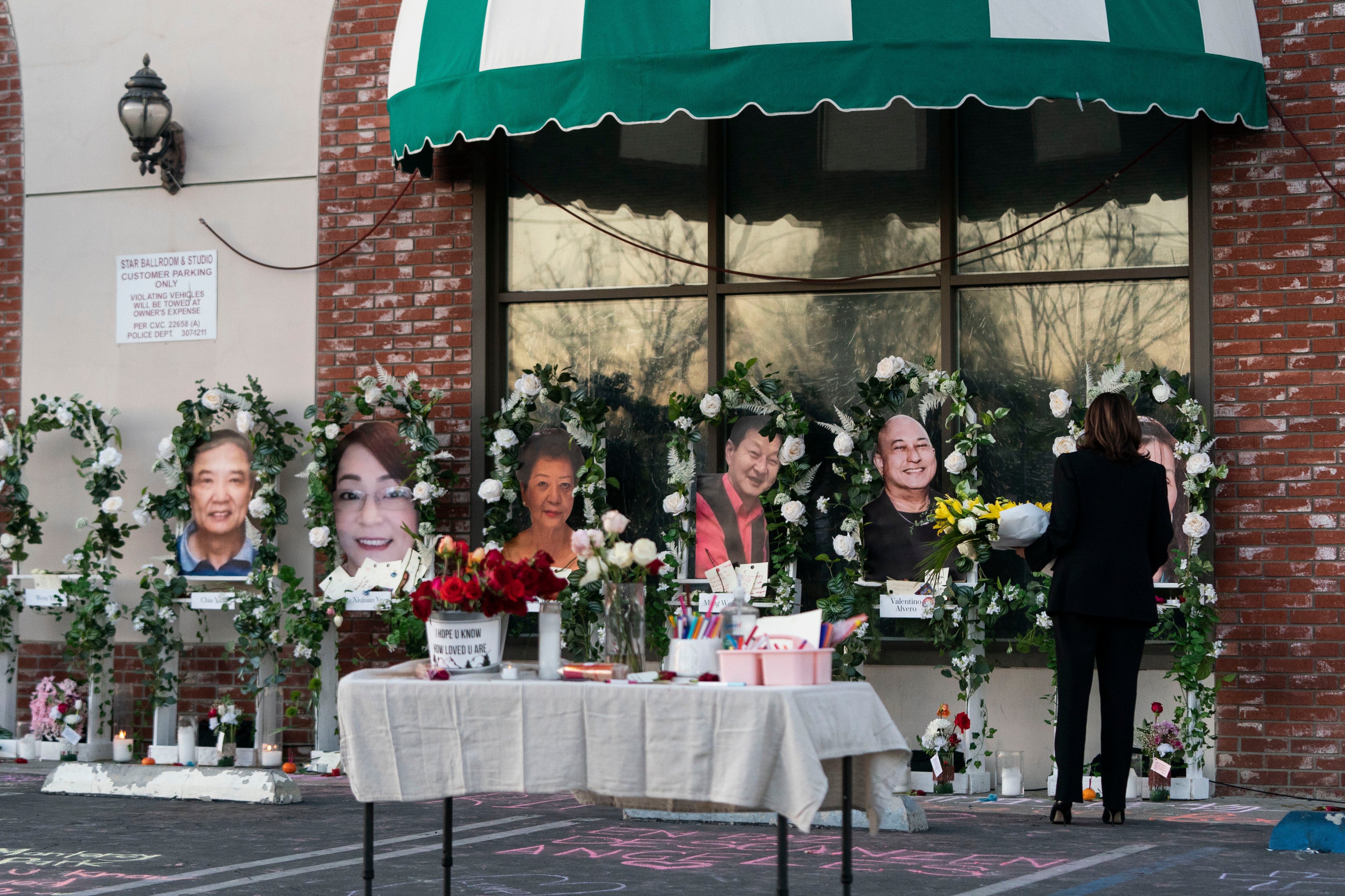 Vice President Kamala Harris visits a memorial set up outside Star Dance Studio in Monterey Park, Calif., Wednesday, Jan. 25, 2023