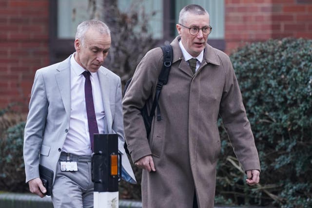 Anthony May, chief executive of Nottingham University Hospitals NHS Trust (right) arriving at Nottingham Magistrates’ Court on Wednesday (Jacob King/PA)