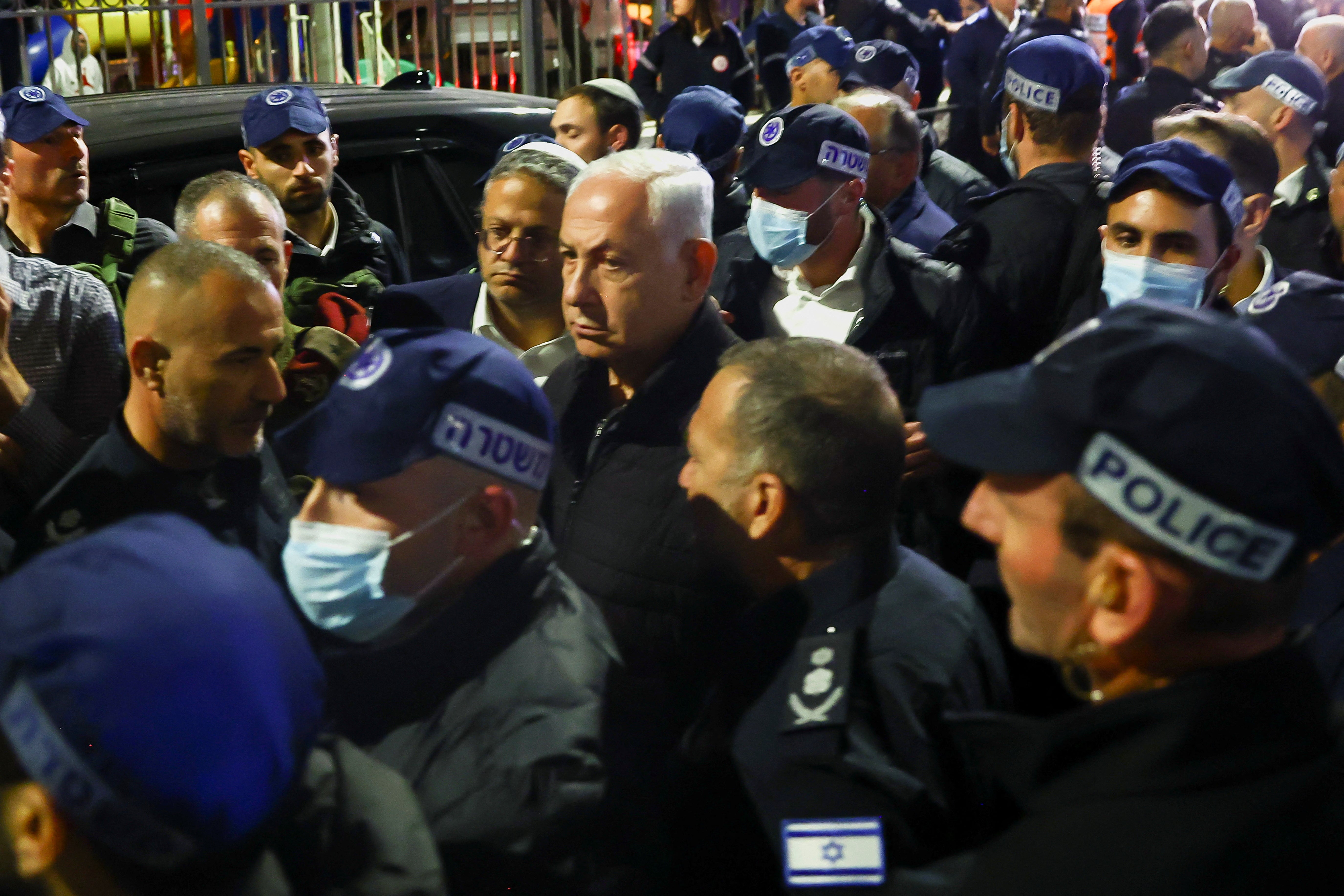 Israeli Prime Minister Benjamin Netanyahu visits the scene