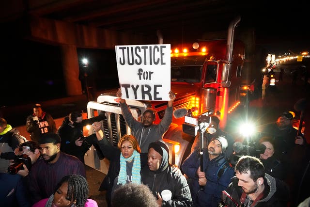 <p>Protesters march down the street Friday, Jan. 27, 2023, in Memphis, Tenn., as authorities release police video depicting five Memphis officers beating Tyre Nichols</p>