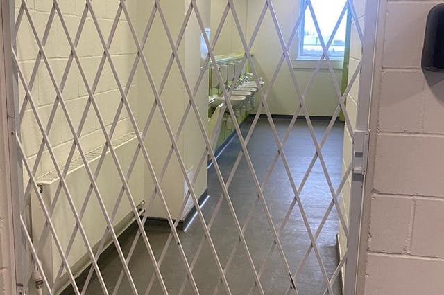 <p>The metal gates preventing access to the toilets</p>