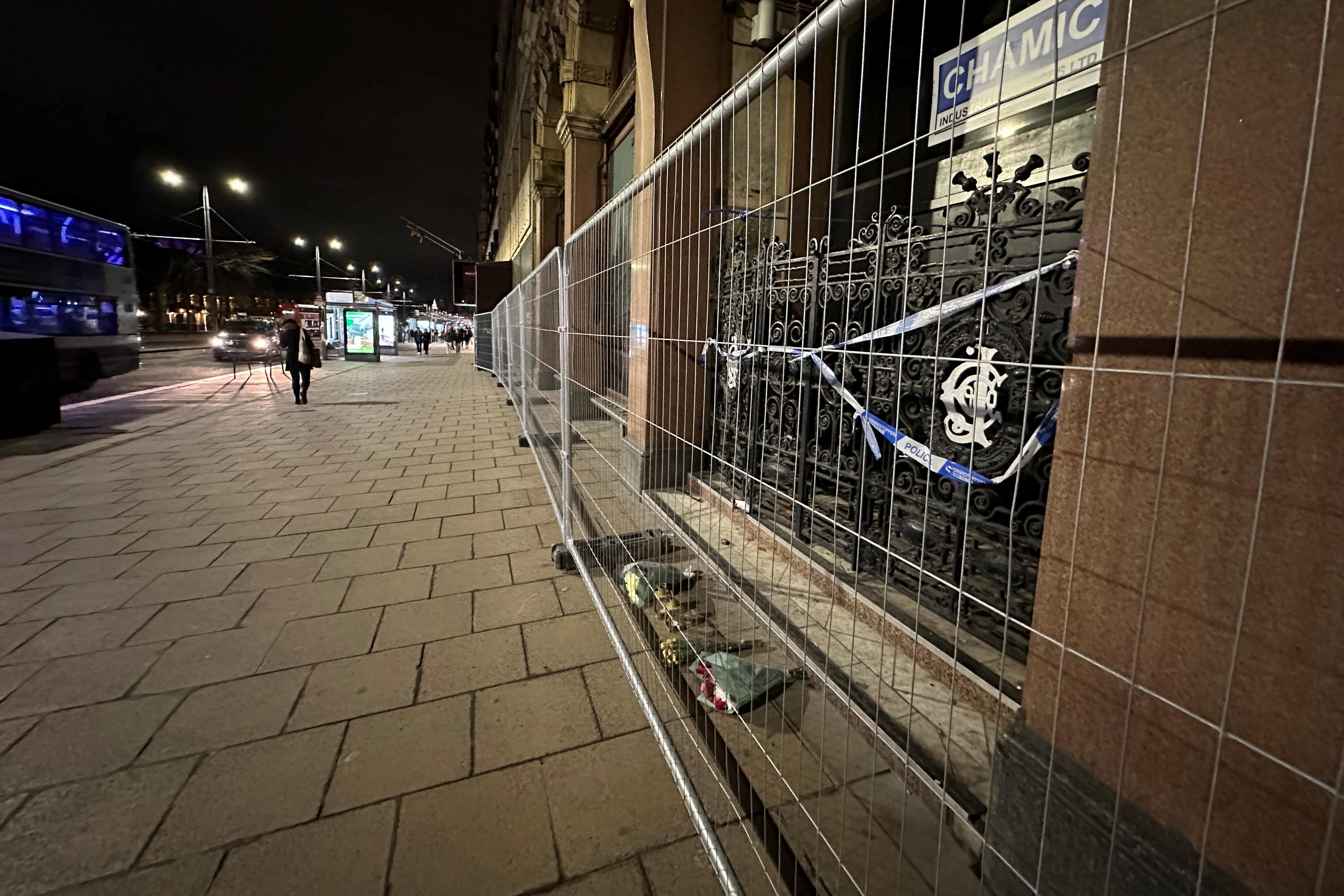 Flowers laid outside Jenners building in Princes Street in Edinburgh (Dan Barker/PA)